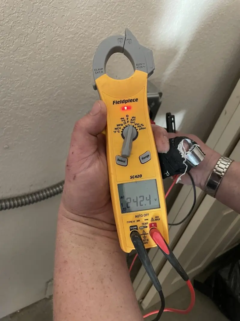 Voltage testing with clamp meter during Electrical Installation Services in High Springs